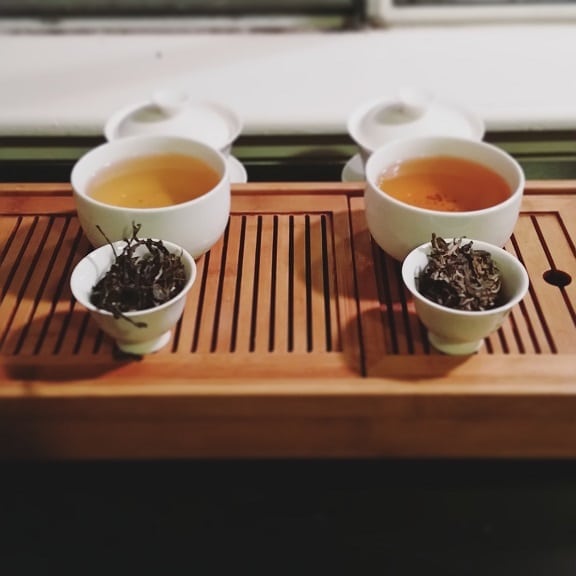 Laos dark tea side by side