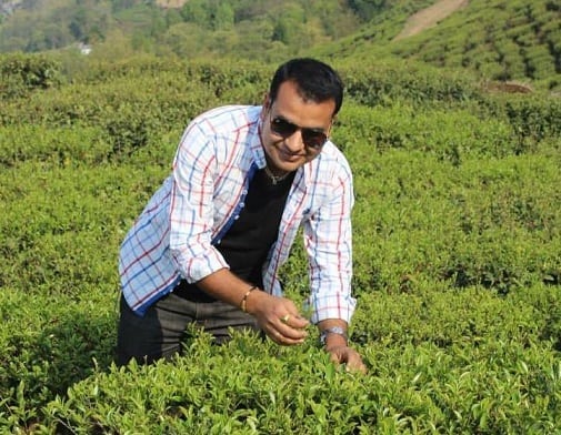 Nabin in a tea field